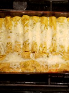 Chicken and Spinach Enchiladas ready to serve